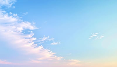 Pastel Sky with Flowing Clouds Wallpaper