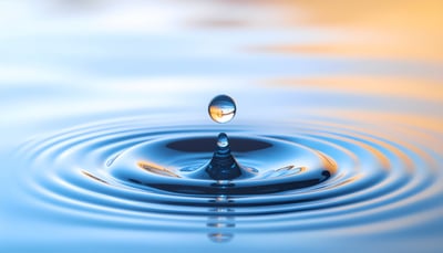 Water Drop and Blue Ripples