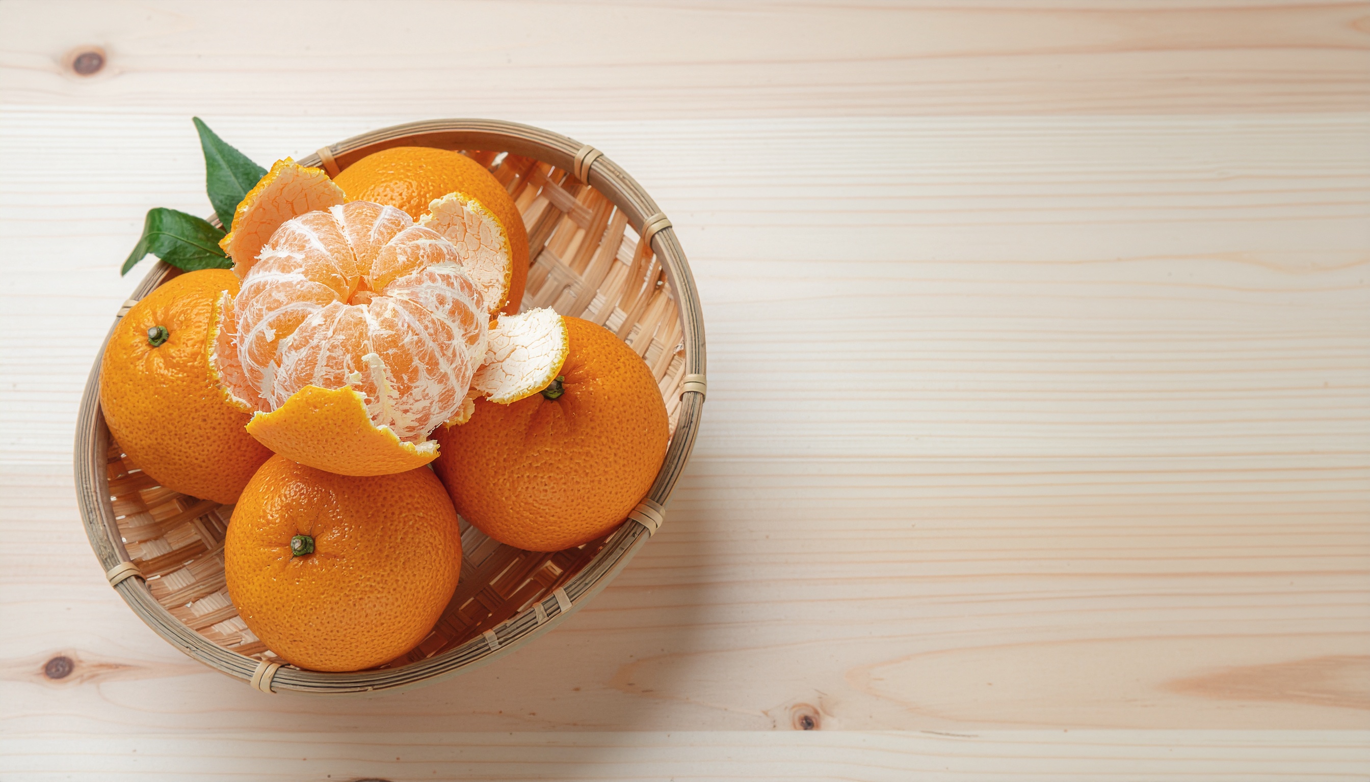 Mandarins in a Bamboo Basket