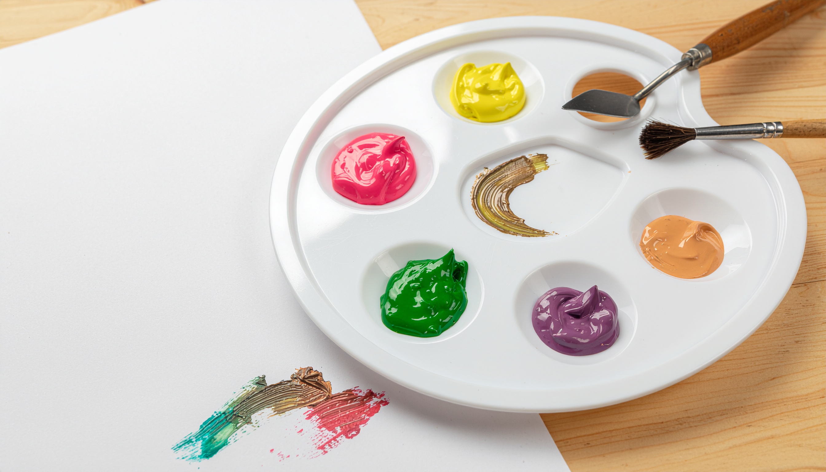 Paints and Mixing on a White Palette