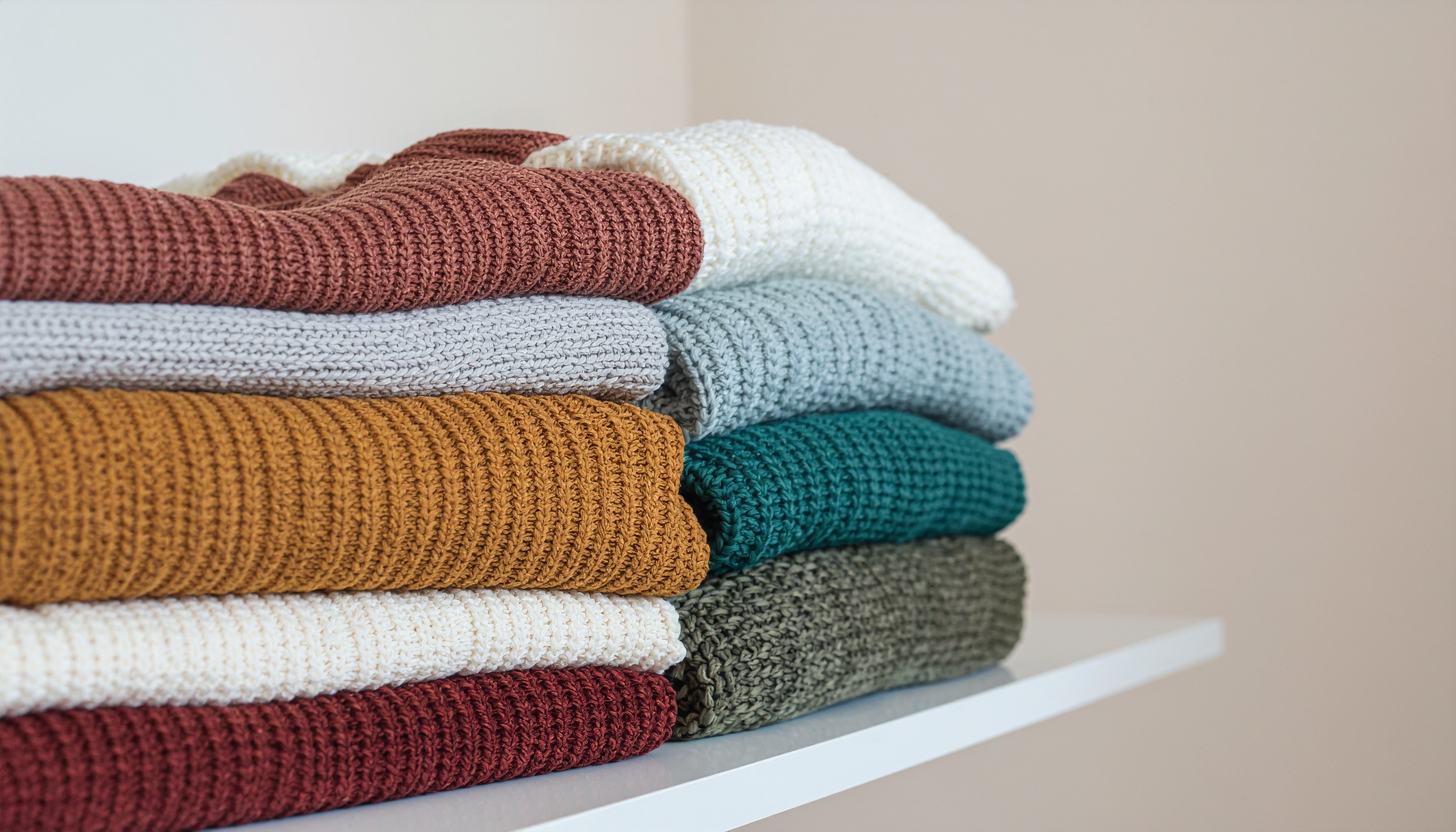 Stacked Knit Sweaters in Different Colors